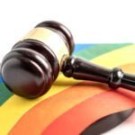 Gavel for judge lawyer on rainbow flag, symbol of LGBT pride mon