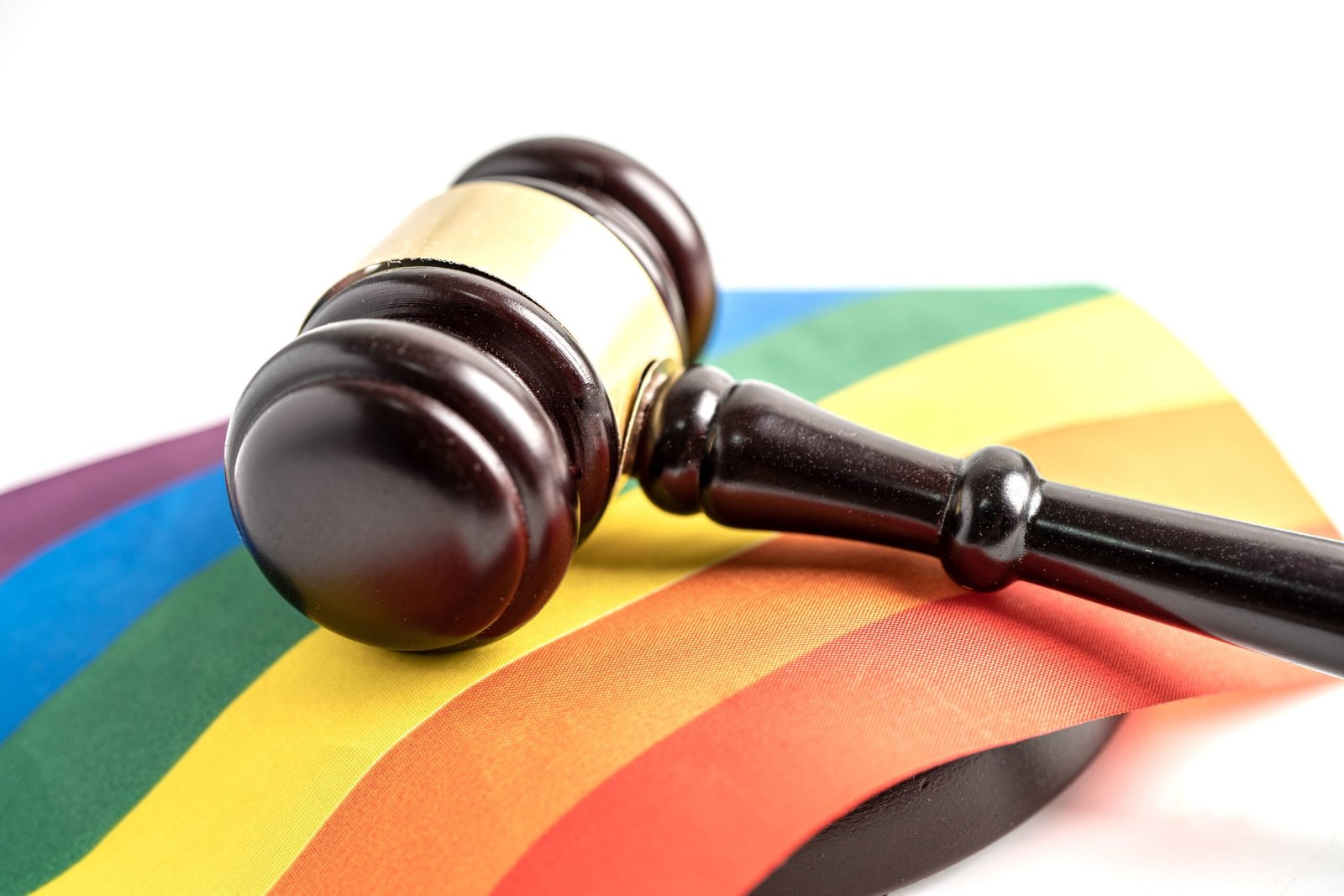 Gavel for judge lawyer on rainbow flag, symbol of LGBT pride mon