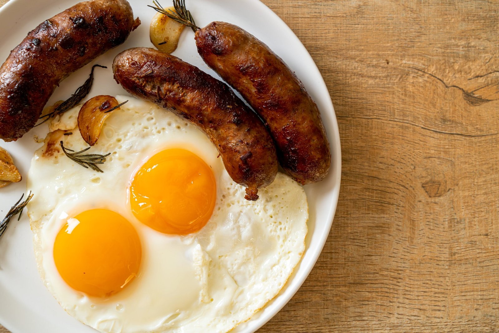 Double fried egg with pork sausage